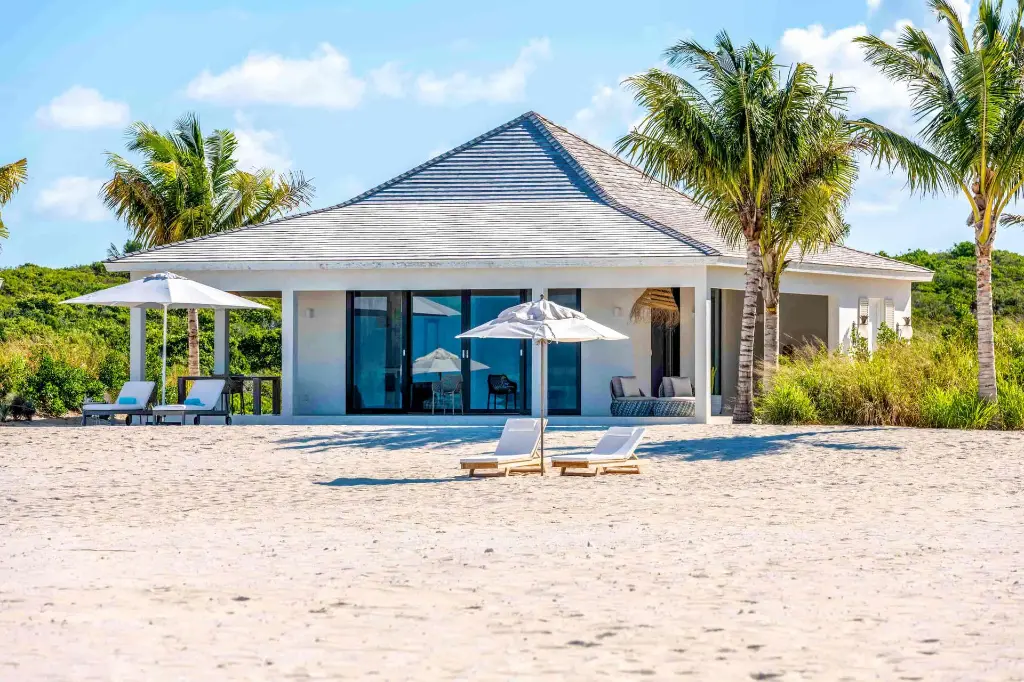62c611d86e3a32a160b17aeb_Beachfront pool suite private island Ambergris Cay.webp
